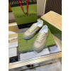 Женские кроссовки с тиснением Gucci 