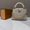 Сумка Louis Vuitton бежевого цвета