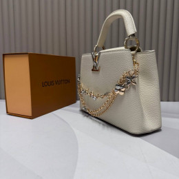 Сумка Louis Vuitton бежевого цвета