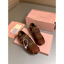 Кроссовки Miu Miu коричневого цвета