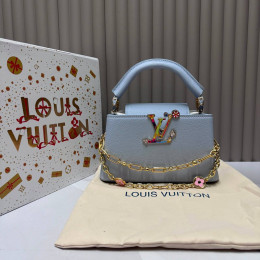 Сумка Louis Vuitton голубого цвета
