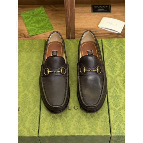 Лоферы Gucci коричневого цвета