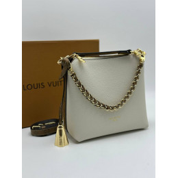 Сумка Louis Vuitton бежевого цвета