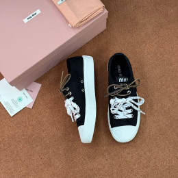 Кеды Miu Miu черного цвета