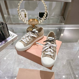 Кеды Miu Miu бежевого цвета