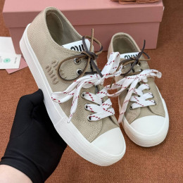 Кеды Miu Miu бежевого цвета