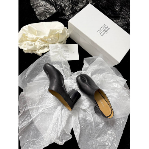 Мюли Maison Margiela черного цвета