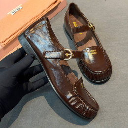 Лоферы Miu Miu коричневого цвета