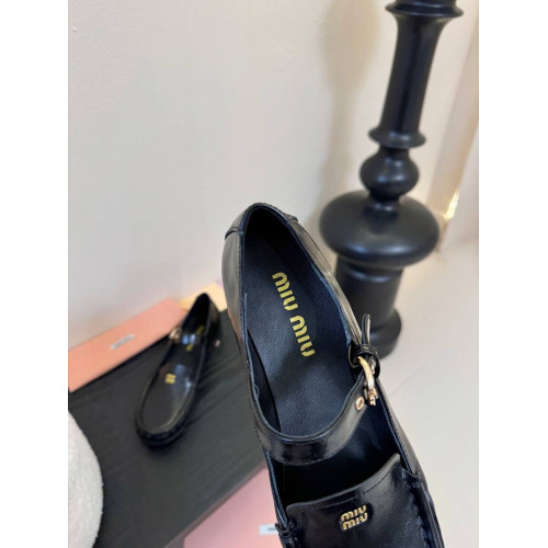 Лоферы Miu Miu черного цвета
