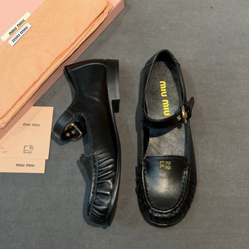 Лоферы Miu Miu черного цвета