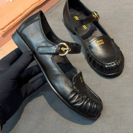 Лоферы Miu Miu черного цвета