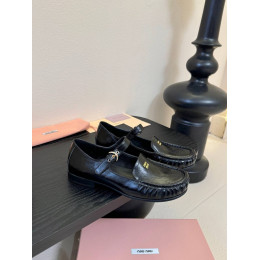 Лоферы Miu Miu черного цвета