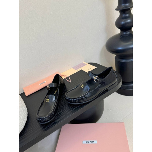 Лоферы Miu Miu черного цвета