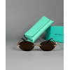 Очки Tiffany & Co. золотистого цвета