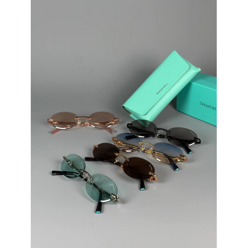 Очки Tiffany & Co. золотистого цвета