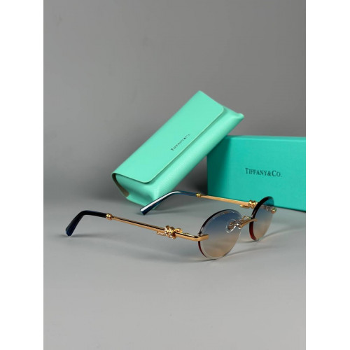 Очки Tiffany & Co. золотистого цвета