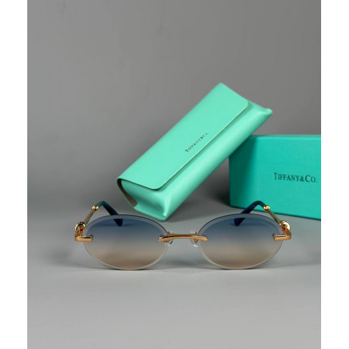 Очки Tiffany & Co. золотистого цвета