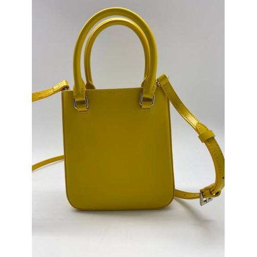 Сумка Prada желтого цвета