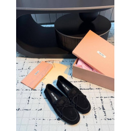 Лоферы Miu Miu черного цвета